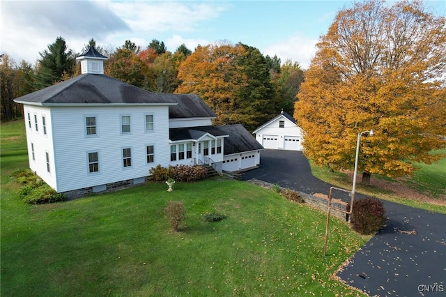 exterior space featuring a front lawn