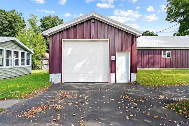 garage with a yard