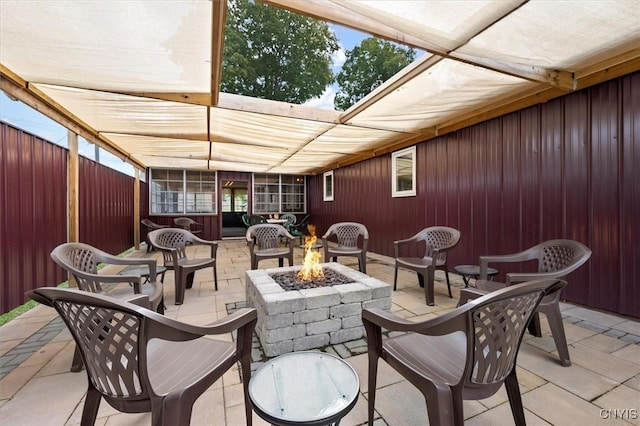 view of patio with an outdoor fire pit