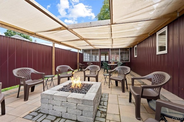 view of patio / terrace featuring a fire pit