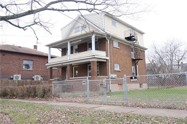 view of front of property with ac unit