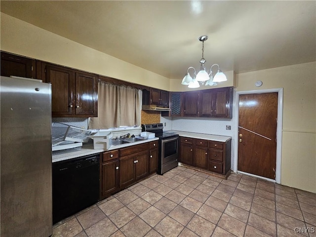 kitchen featuring appliances with stainless steel finishes, dark brown cabinets, sink, pendant lighting, and a chandelier