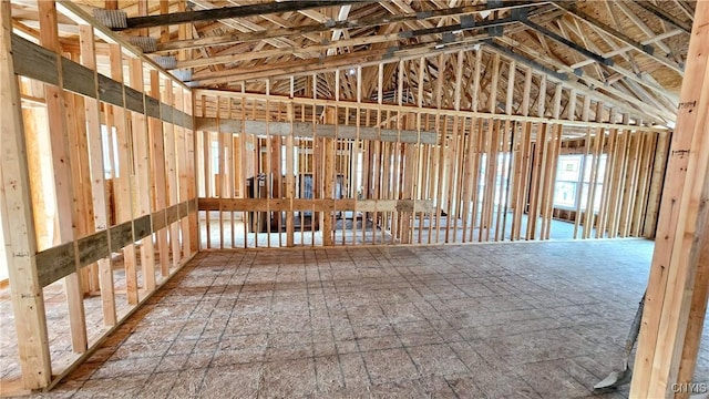 misc room with lofted ceiling