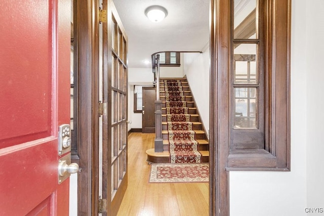 entrance foyer featuring hardwood / wood-style flooring