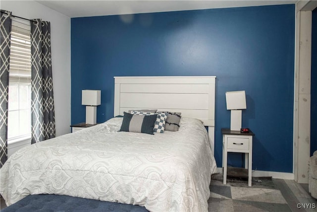 bedroom featuring wood-type flooring