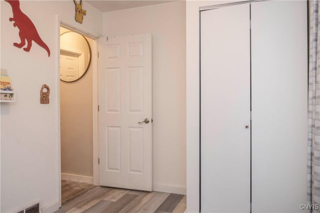 hallway featuring light wood-type flooring