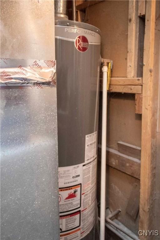 utility room with water heater