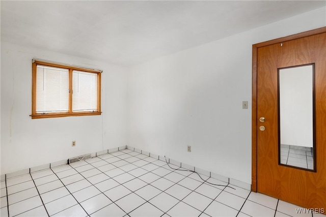 view of tiled spare room