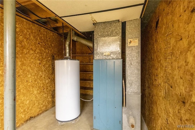 utility room featuring gas water heater