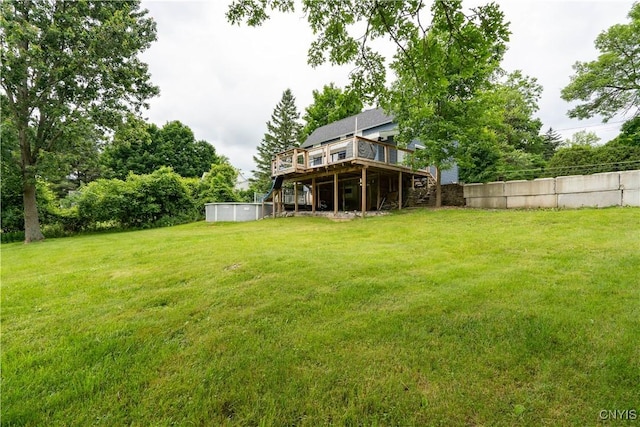 view of yard with a wooden deck