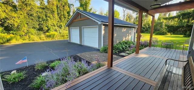 garage featuring a lawn