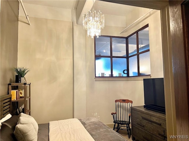 bedroom with a chandelier