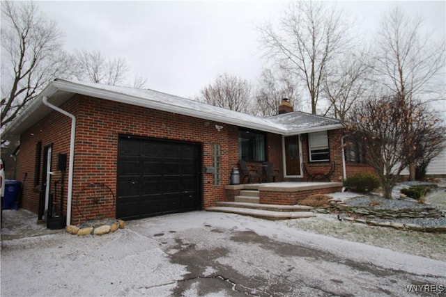 single story home with a garage