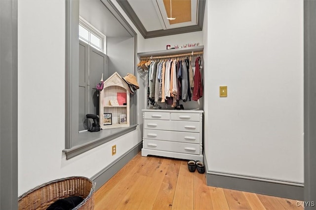 walk in closet featuring light wood-type flooring