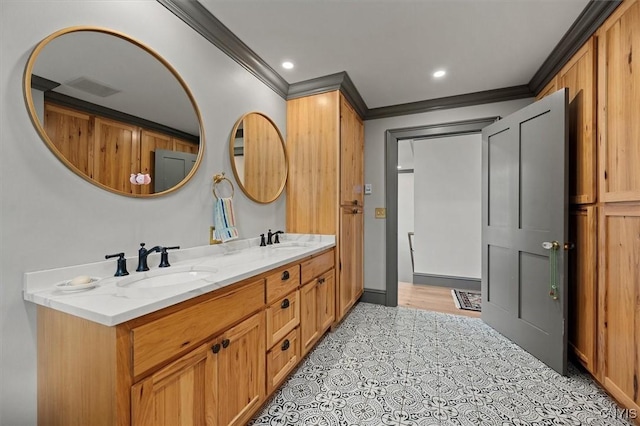 bathroom featuring vanity and crown molding