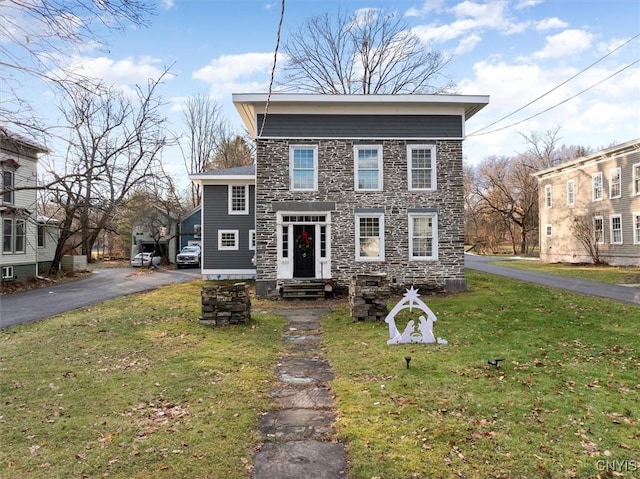 view of front of house with a front yard