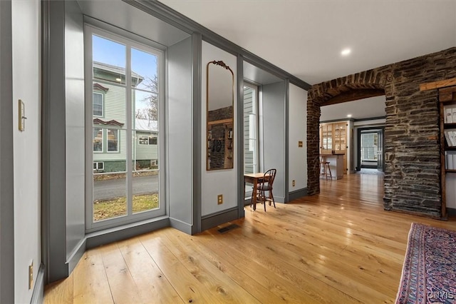 doorway to outside featuring light hardwood / wood-style flooring