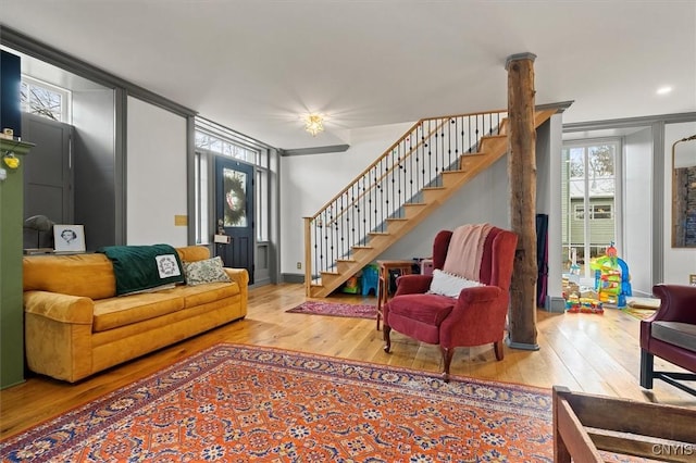 living room with light hardwood / wood-style flooring