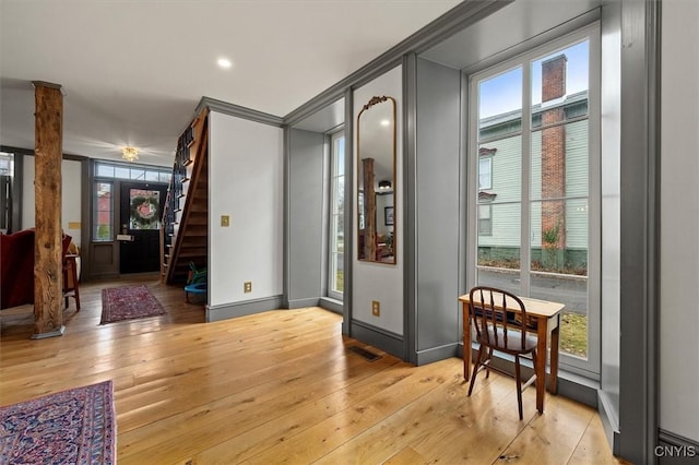 foyer entrance featuring light wood-type flooring