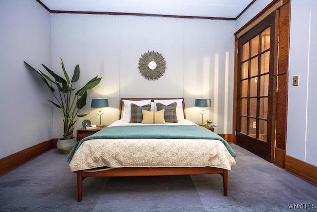 carpeted bedroom featuring ornamental molding