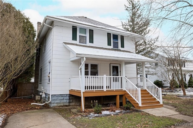 view of front of home featuring covered porch