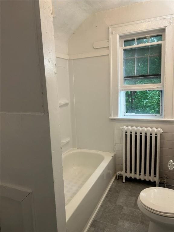 bathroom with radiator and toilet