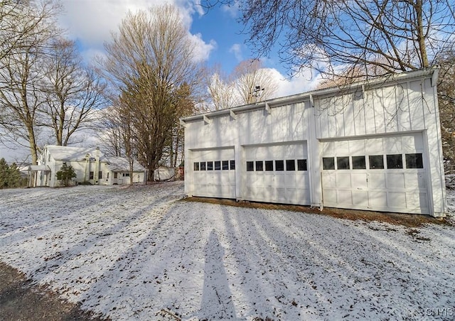 view of snow covered garage