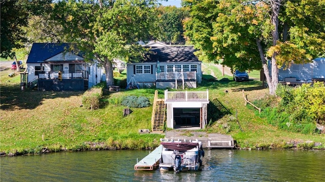 view of dock with a deck with water view