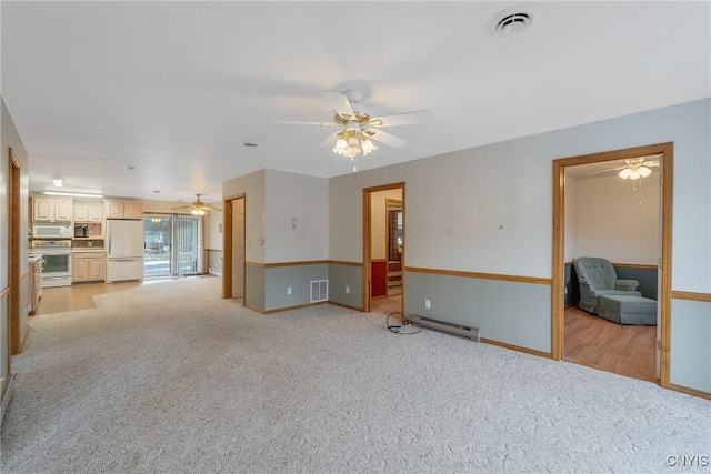 unfurnished living room with ceiling fan, baseboard heating, and light carpet