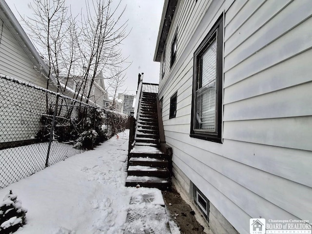 view of snow covered property