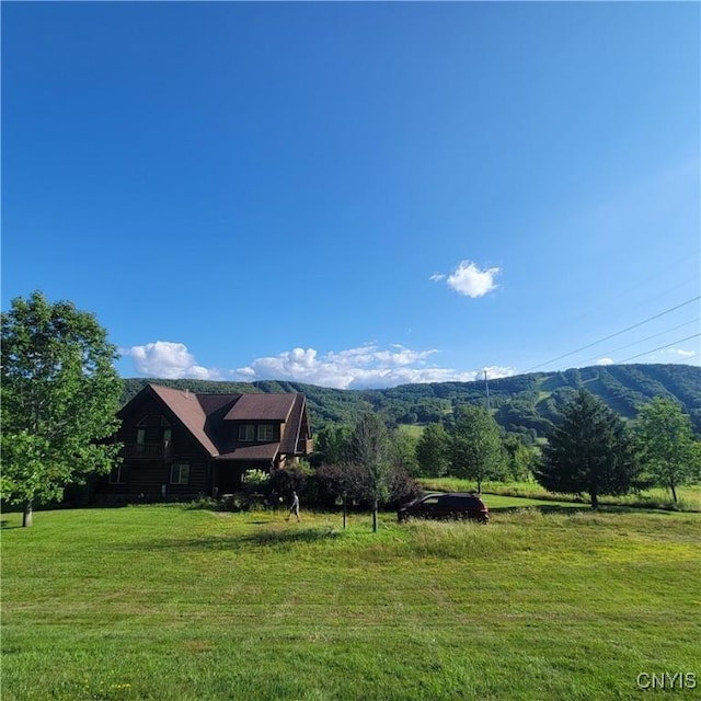 mountain view featuring a rural view