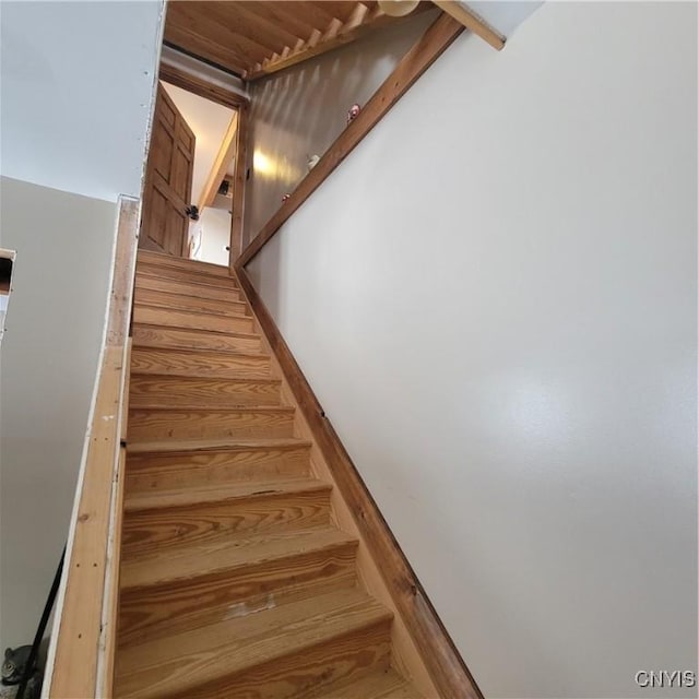 staircase featuring wood ceiling