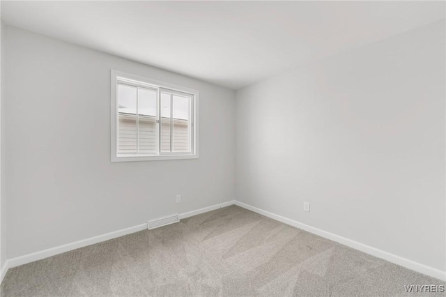 unfurnished room with carpet