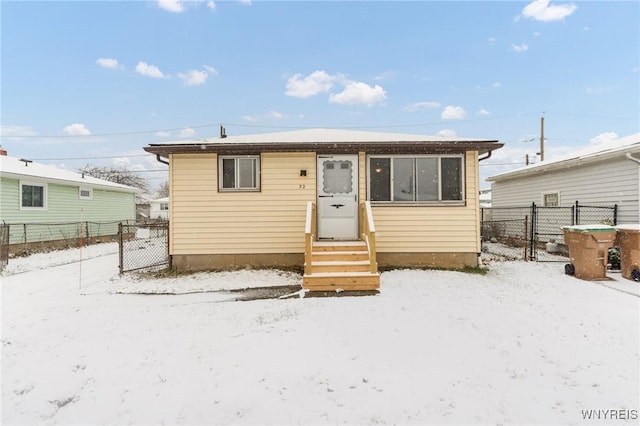 view of snow covered house