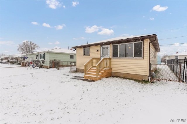 view of snow covered property