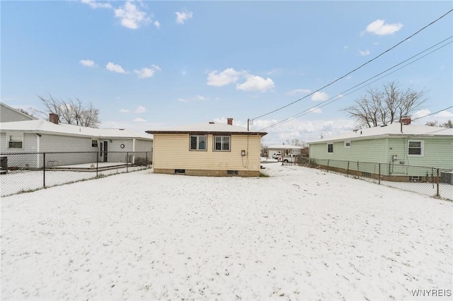 view of snow covered house