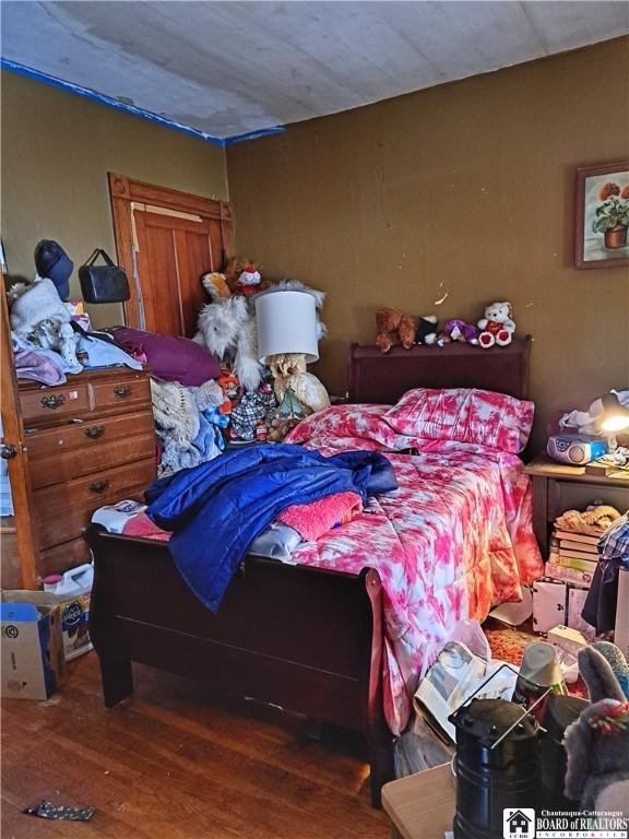 bedroom featuring hardwood / wood-style floors