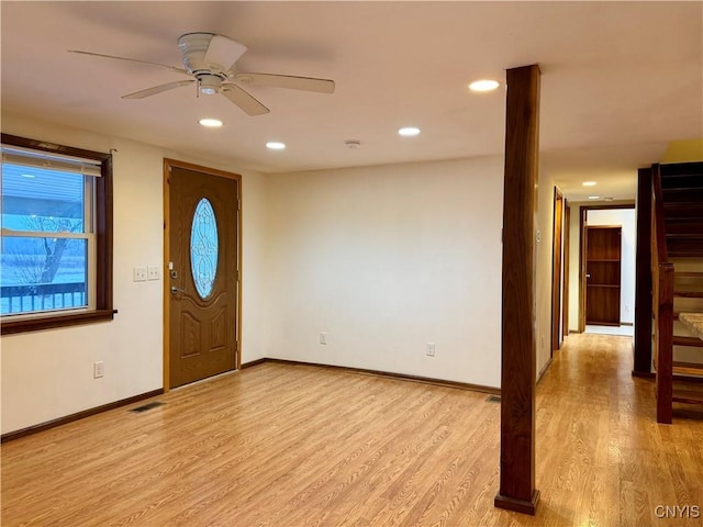 entrance foyer featuring ceiling fan and light hardwood / wood-style flooring