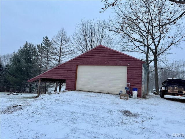 view of snow covered garage