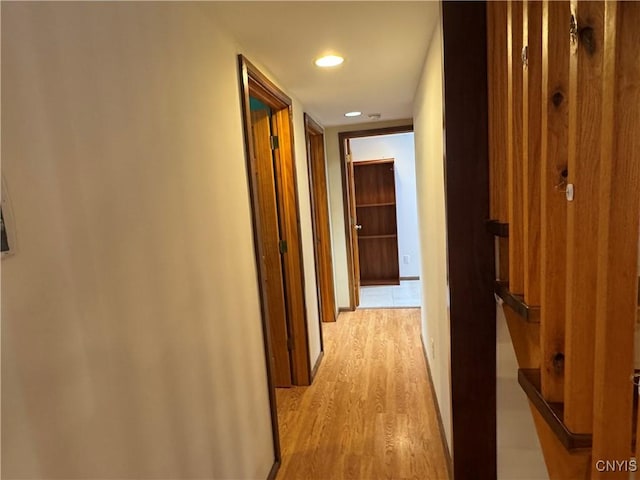 corridor featuring light wood-type flooring