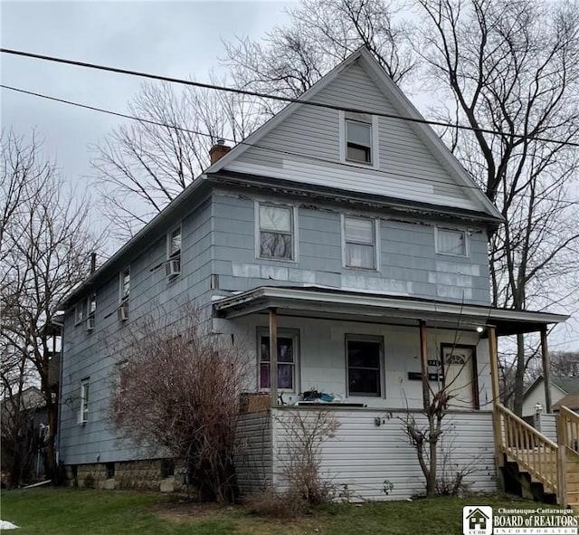 view of front of home featuring covered porch