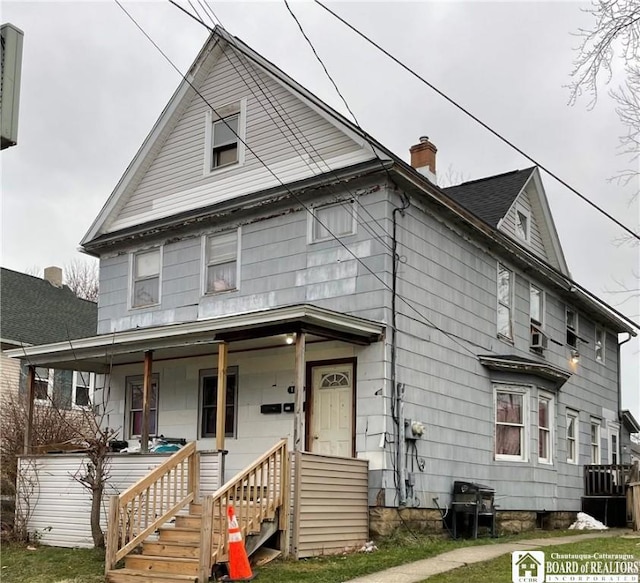 view of front of home featuring covered porch