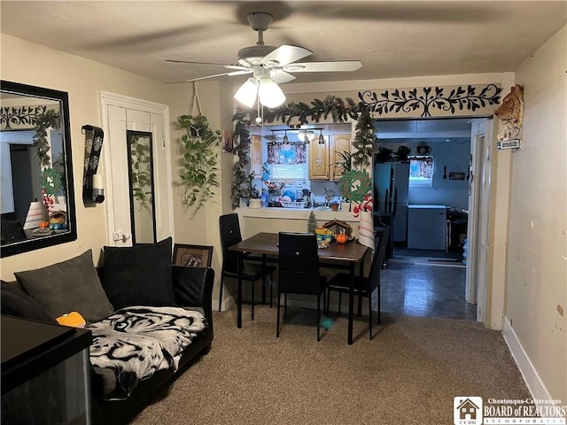 dining area with ceiling fan