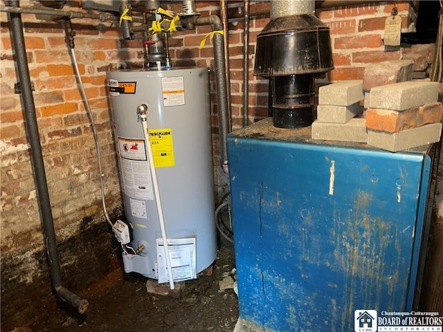 utility room with gas water heater