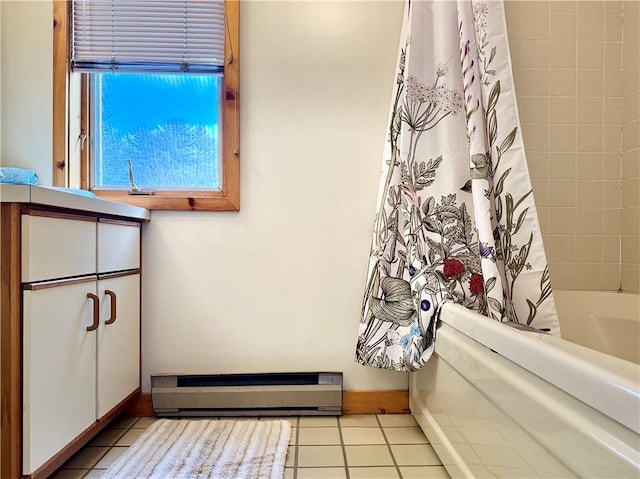 bathroom featuring tile patterned floors, shower / bath combo, and a baseboard radiator