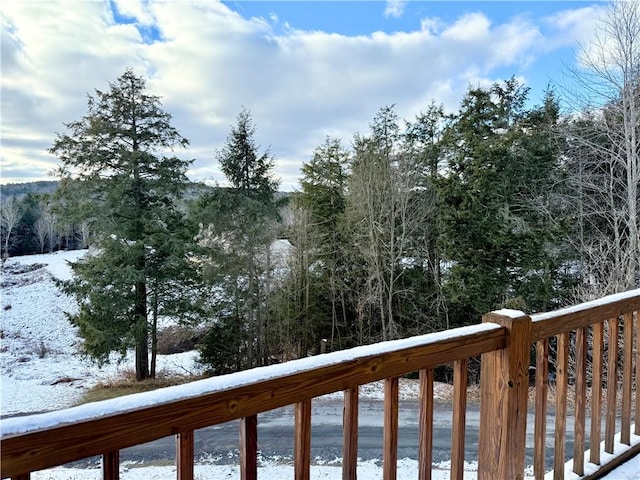 view of snow covered deck