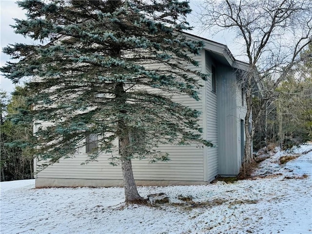 view of snow covered property