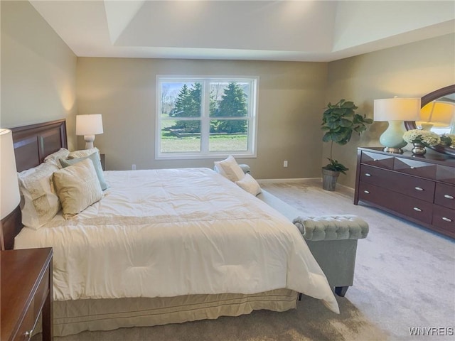 bedroom featuring light carpet