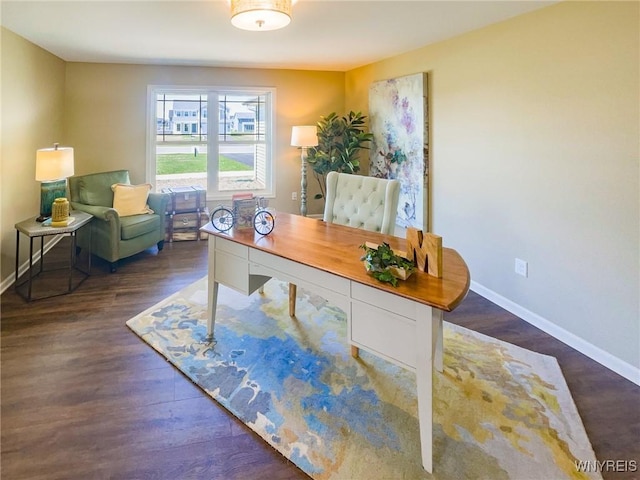 home office with dark wood-type flooring