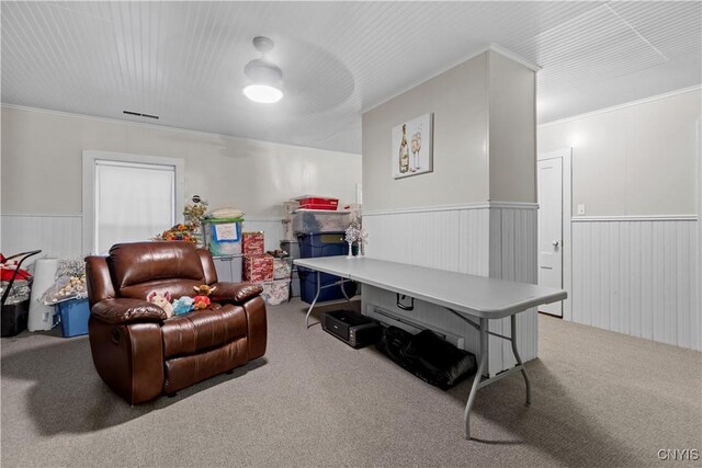 interior space with crown molding and carpet floors